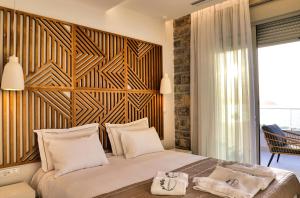 Postel nebo postele na pokoji v ubytování OLIVIA'S Villas + 26 fotografií