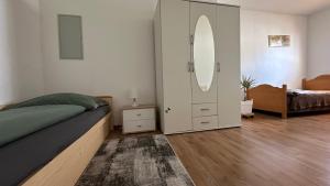 Postel nebo postele na pokoji v ubytování Ferienwohnung Casa Claudia