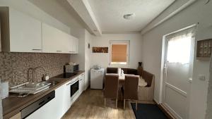 Kuchyň nebo kuchyňský kout v ubytování Ferienwohnung Casa Claudia