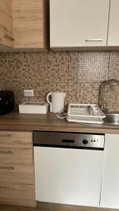 Kuchyň nebo kuchyňský kout v ubytování Ferienwohnung Casa Claudia