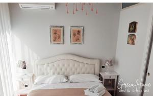 Postel nebo postele na pokoji v ubytování B&B Greco Home