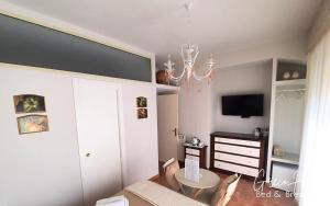 TV a/nebo společenská místnost v ubytování B&B Greco Home