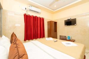 TV a/nebo společenská místnost v ubytování Amman Residency - Rameswaram