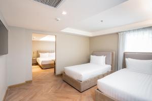 Katil atau katil-katil dalam bilik di Away Bangkok Riverside Kene