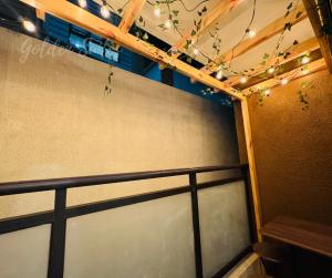 a garage door with lights on top of it at GOLDEN SUITES BAGUIO in Baguio