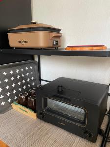 Posezení v ubytování 919Takarazuka 宝塚駅前 デザイナーズ2Bed Room Max6人甲子園-大阪-神戸迄25分
