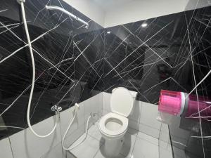 Fotografie z fotogalerie ubytování Cozy Home 2 Manado RedPartner v destinaci Manado