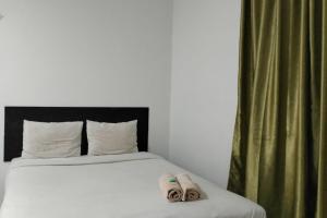 Fotografie z fotogalerie ubytování Cozy Home 2 Manado RedPartner v destinaci Manado