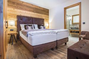 Postel nebo postele na pokoji v ubytování Alpenchalet Prinsengut