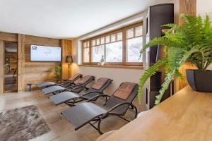 TV a/nebo společenská místnost v ubytování Alpenchalet Prinsengut