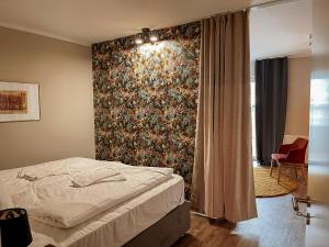 Ein Bett oder Betten in einem Zimmer der Unterkunft Apt Prinz Maximilian - Zentrum - Zimmerprinzen