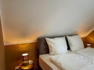 Ein Bett oder Betten in einem Zimmer der Unterkunft Apt Prinz Maximilian - Zentrum - Zimmerprinzen