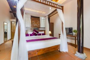 Et tv og/eller underholdning på Maison Du VietNam Resort & Spa