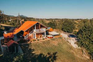an overhead view of a house with an orange roof at Kuča za odmor Stina in Slavetić