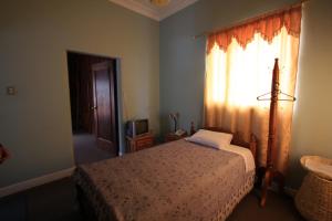 Letto o letti in una camera di Travellers Inn