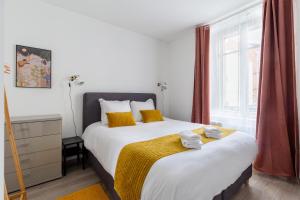 Posteľ alebo postele v izbe v ubytovaní Travel Homes - Niffel 1 - Un havre de paix près du Parc