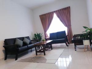 Posezení v ubytování Muar Town Suite
