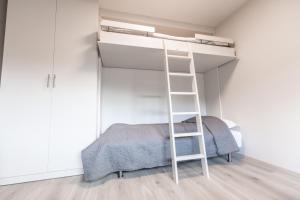 Giường trong phòng chung tại Ansgar Summerhotel