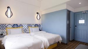 Cama o camas de una habitación en Kampi Hotel Legian