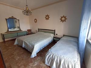 Postel nebo postele na pokoji v ubytování Alba sul mare