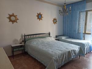 Postel nebo postele na pokoji v ubytování Alba sul mare