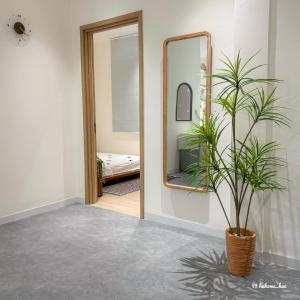 Ένα ή περισσότερα κρεβάτια σε δωμάτιο στο Hạ Home Huế - Căn hộ riêng tư trung tâm 2 phòng ngủ