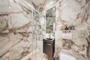 Un baño de TheWICKI 22 - Wunderschöne Apartments in Wien