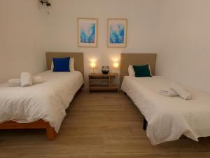 Posteľ alebo postele v izbe v ubytovaní Preciosa Villa Independiente 100metros playa 10personas, Free Parking, Fully renovated Now