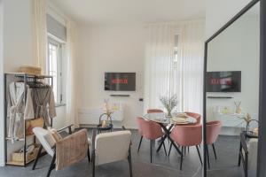 TV a/nebo společenská místnost v ubytování Piccola Como Lotus by Rent All Como