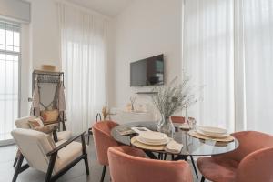 TV a/nebo společenská místnost v ubytování Piccola Como Lotus by Rent All Como