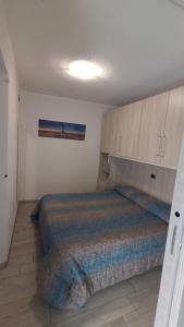 Кровать или кровати в номере Casa Nicolò