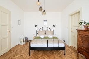 Posteľ alebo postele v izbe v ubytovaní Romantic apartment in the city centre