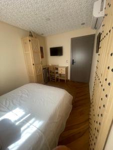 Voodi või voodid majutusasutuse ANNI Guesthouse Hostel toas