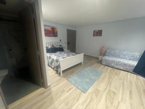 Voodi või voodid majutusasutuse ANNI Guesthouse Hostel toas