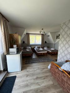 Kuchyňa alebo kuchynka v ubytovaní Pokoje i Apartamenty Regionalny Styl ul Króle 1a Zakopane
