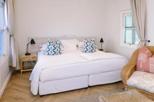 Auberge Burgundy Boutique Hotel & Spa客房内的一张或多张床位