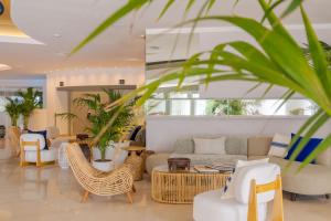 Uma área de estar em Pestana Blue Alvor Beach - All Inclusive Hotel