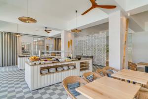 Um restaurante ou outro lugar para comer em Pestana Blue Alvor Beach - All Inclusive Hotel