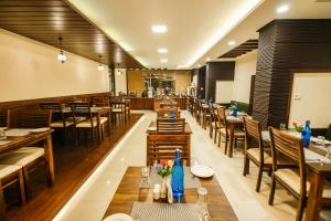Restoran või mõni muu söögikoht majutusasutuses Hotel Bella Heights