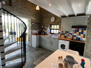 Η κουζίνα ή μικρή κουζίνα στο Granary Cottage St Clears
