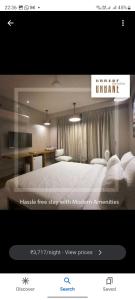 hotel sonali regency客房内的一张或多张床位
