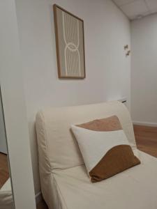A bed or beds in a room at Appartement urbain Hypercentre 40m2