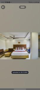 博帕尔hotel sonali regency的房间里有一张床的卧室
