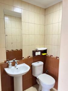 Koupelna v ubytování Гетьман Готель & SPA