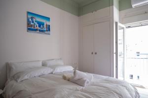 Una cama o camas en una habitación de 舒适漂亮的休闲公寓
