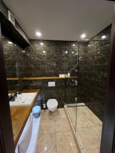 Koupelna v ubytování Гетьман Готель & SPA