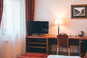 TV a/nebo společenská místnost v ubytování Hotel Ariston Prague