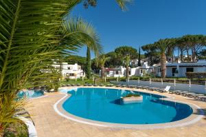 Πισίνα στο ή κοντά στο Albufeira Balaia Golf Vilage 5 With Pool by Homing