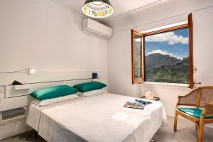 Katil atau katil-katil dalam bilik di GOCCE VILLAS - Rifugio Caprese