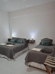 Postel nebo postele na pokoji v ubytování Departamento Rivadavia